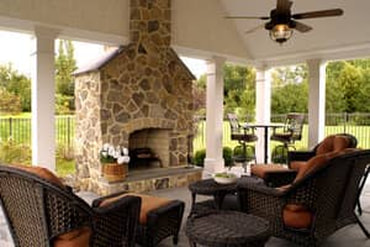 Natural stone outdoor fireplace and hearth